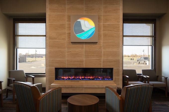 Grand Avenue Dental Care waiting area with fireplace